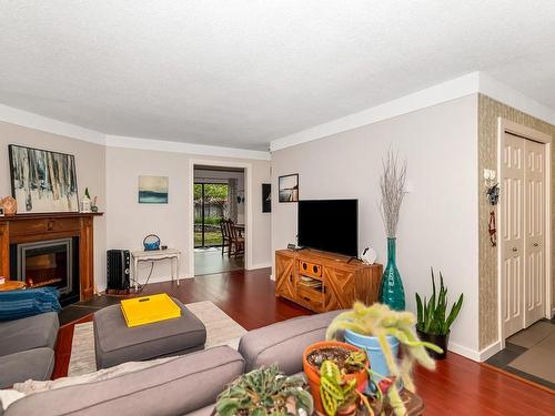 A-930 Old Esquimalt Rd, Esquimalt, BC - Indoor Photo Showing Living Room With Fireplace