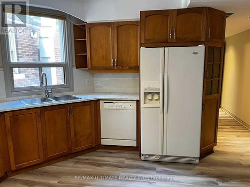 #1 -1942 Queen St E, Toronto, ON - Indoor Photo Showing Kitchen With Double Sink