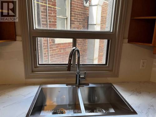 #1 -1942 Queen St E, Toronto, ON - Indoor Photo Showing Kitchen With Double Sink