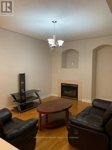 40 Redfinch Cres, Vaughan, ON - Indoor Photo Showing Living Room With Fireplace