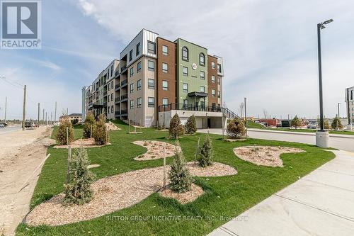 #404 -6 Spice Way, Barrie, ON - Outdoor With Facade
