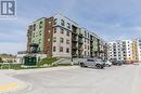 #404 -6 Spice Way, Barrie, ON  - Outdoor With Balcony With Facade 