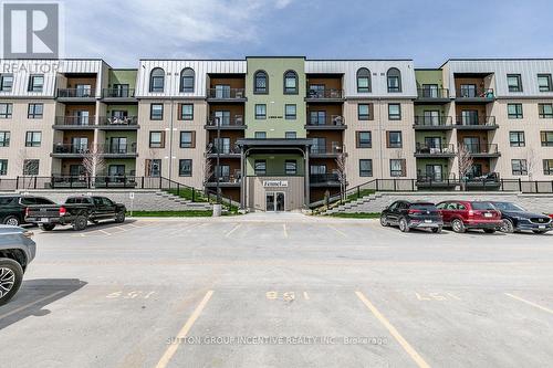 #404 -6 Spice Way, Barrie, ON - Outdoor With Balcony With Facade
