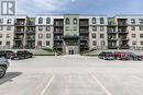 #404 -6 Spice Way, Barrie, ON  - Outdoor With Balcony With Facade 
