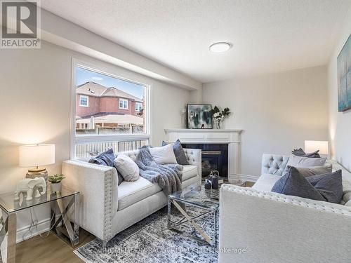 15 Flatlands Way, Brampton, ON - Indoor Photo Showing Living Room With Fireplace