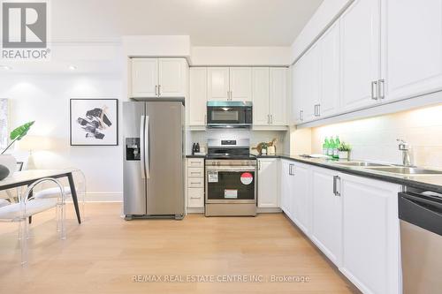 #3028 -3888 Duke Of York Blvd, Mississauga, ON - Indoor Photo Showing Kitchen With Stainless Steel Kitchen With Double Sink
