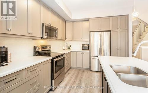 #22 -1890 Rymal Rd E, Hamilton, ON - Indoor Photo Showing Kitchen With Stainless Steel Kitchen With Double Sink With Upgraded Kitchen