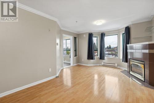 402 6963 Victoria Drive, Vancouver, BC - Indoor With Fireplace