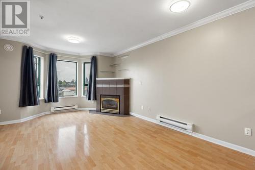 402 6963 Victoria Drive, Vancouver, BC - Indoor With Fireplace