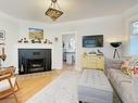 1564 Monterey Ave, Oak Bay, BC  - Indoor Photo Showing Living Room With Fireplace 