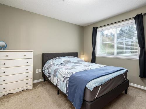 102-129 Back Rd, Courtenay, BC - Indoor Photo Showing Bedroom