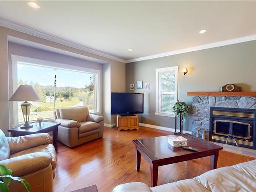 7579 Lemare Cres, Sooke, BC - Indoor Photo Showing Living Room With Fireplace