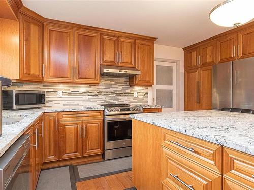 4042 Cavallin Crt, Saanich, BC - Indoor Photo Showing Kitchen With Upgraded Kitchen