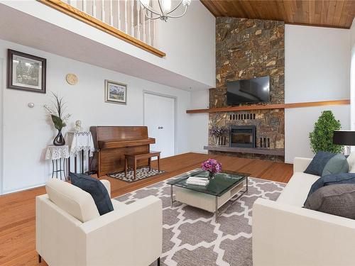 4042 Cavallin Crt, Saanich, BC - Indoor Photo Showing Living Room With Fireplace