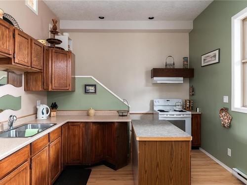 782 & 784 Ebadora Lane, Malahat, BC - Indoor Photo Showing Kitchen With Double Sink
