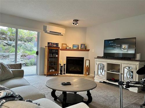 550 Rothdale Rd, Ladysmith, BC - Indoor Photo Showing Living Room With Fireplace