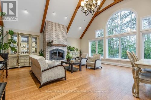 3-1058 Whites Road, Muskoka Lakes, ON - Indoor Photo Showing Living Room With Fireplace