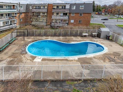 Pool - 303-6320 Place Bonaventure, Brossard, QC - Outdoor With In Ground Pool