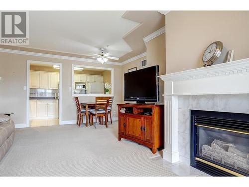 3220 Centennial Drive Unit# 312, Vernon, BC - Indoor Photo Showing Living Room With Fireplace