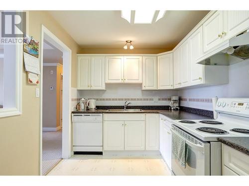 3220 Centennial Drive Unit# 312, Vernon, BC - Indoor Photo Showing Kitchen With Double Sink
