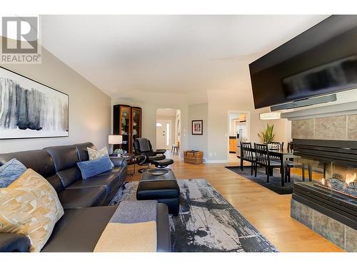3936 Gallaghers Parkway, Kelowna, BC - Indoor Photo Showing Living Room With Fireplace