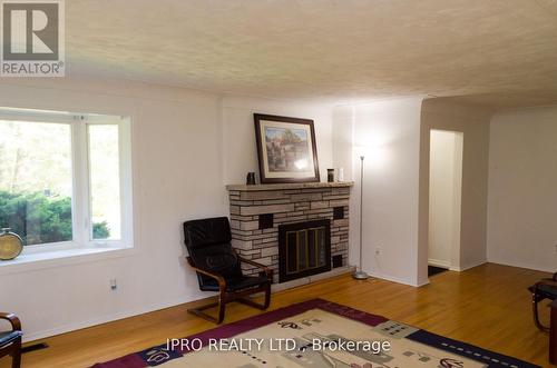 26 Best Ave, Hamilton, ON - Indoor Photo Showing Living Room With Fireplace