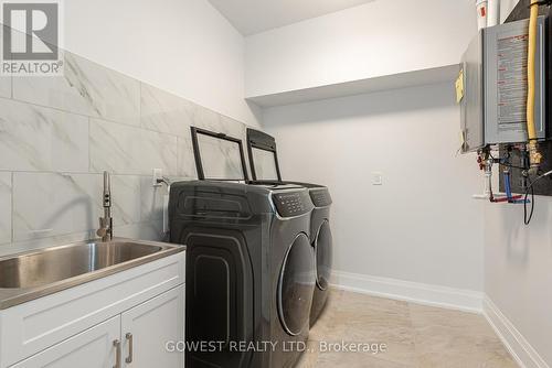 20 Tasker Street, St. Catharines, ON - Indoor Photo Showing Laundry Room