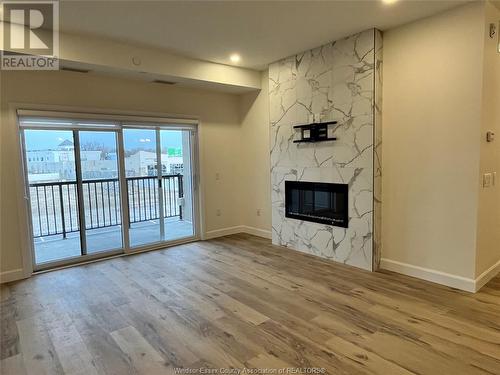 1740 Sprucewood Avenue Unit# 201, Lasalle, ON - Indoor With Fireplace