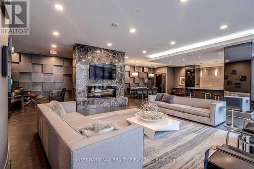 #1811 -5162 Yonge St S, Toronto, ON - Indoor Photo Showing Living Room With Fireplace