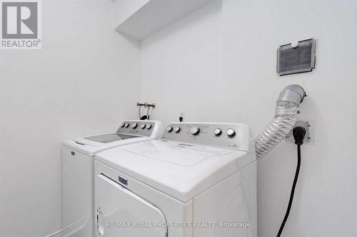 1503 - 28 Rosebank Drive, Toronto, ON - Indoor Photo Showing Laundry Room