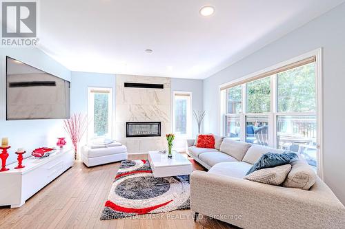 1498 Spartan Grove St, Ottawa, ON - Indoor Photo Showing Living Room With Fireplace