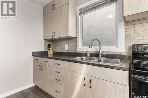 908 Elliott Street, Regina, SK - Indoor Photo Showing Kitchen With Double Sink