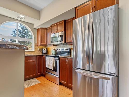 405-7922 Okanagan Landing Road, Vernon, BC - Indoor Photo Showing Kitchen With Stainless Steel Kitchen