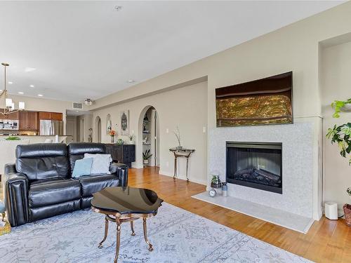 405-7922 Okanagan Landing Road, Vernon, BC - Indoor Photo Showing Living Room With Fireplace