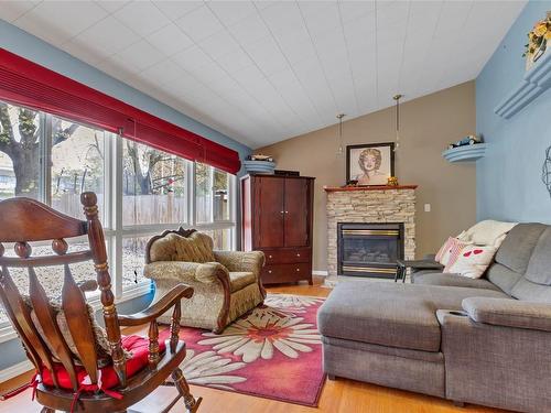 3400 Pleasant Valley Road, Vernon, BC - Indoor Photo Showing Living Room With Fireplace