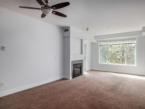 313-2532 Shoreline Drive, Lake Country, BC - Indoor With Fireplace