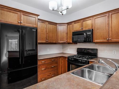 313-2532 Shoreline Drive, Lake Country, BC - Indoor Photo Showing Kitchen With Double Sink