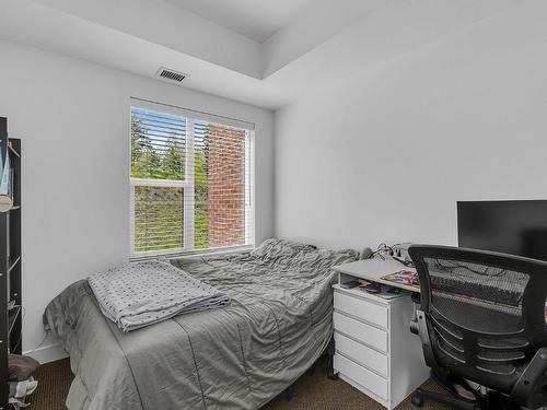 313-975 Academy Way, Kelowna, BC - Indoor Photo Showing Bedroom