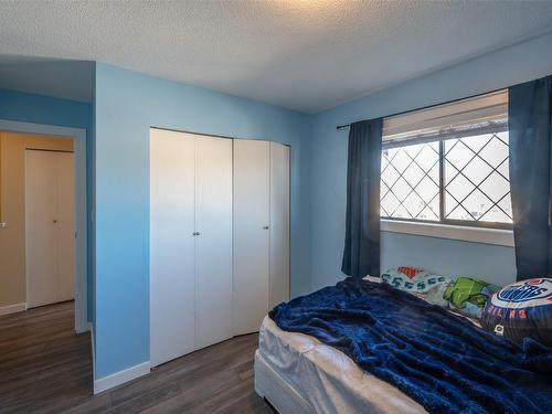 122&124 Highland Place, Penticton, BC - Indoor Photo Showing Bedroom