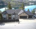 13980 Ponderosa Way, Coldstream, BC  - Outdoor With Body Of Water With Facade 