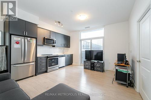 321 - 8 Nahani Way, Mississauga, ON - Indoor Photo Showing Kitchen With Stainless Steel Kitchen