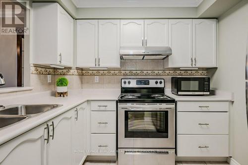 #2407 -100 Burloak Dr, Burlington, ON - Indoor Photo Showing Kitchen With Stainless Steel Kitchen With Double Sink