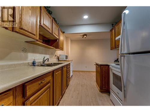 2085 Gordon Drive Unit# 208, Kelowna, BC - Indoor Photo Showing Kitchen With Double Sink