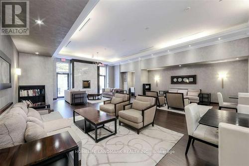 #1407 -133 Wynford Dr, Toronto, ON - Indoor Photo Showing Living Room With Fireplace