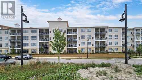 #118 -50 Lakebreeze Dr, Clarington, ON - Outdoor With Balcony With Facade