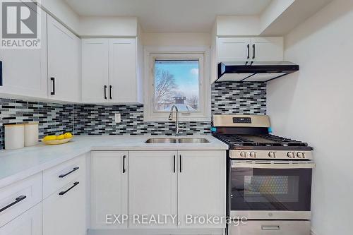 15 Vanbrugh Ave, Toronto, ON - Indoor Photo Showing Kitchen With Double Sink
