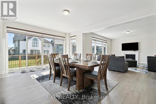 100 Stoneleigh Dr, Blue Mountains, ON - Indoor Photo Showing Dining Room With Fireplace