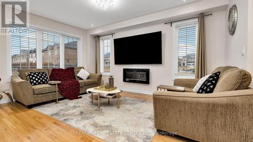 38 Clunburry Road, Brampton, ON - Indoor Photo Showing Living Room With Fireplace