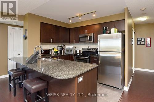 709 - 1940 Ironstone Drive, Burlington, ON - Indoor Photo Showing Kitchen With Stainless Steel Kitchen With Double Sink