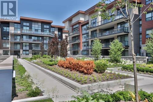 322 - 1575 Lakeshore Road W, Mississauga, ON - Outdoor With Balcony With Facade